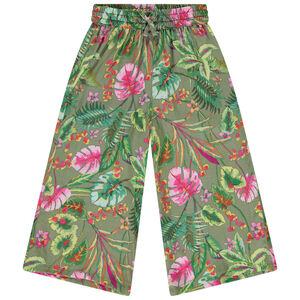 Pantalón pirata fluido y evasé estampado tropical para niña. 