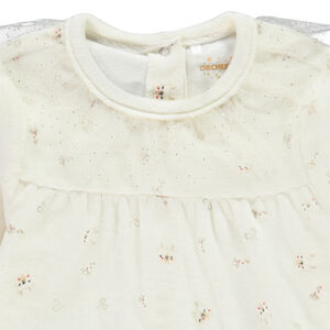 Pelele de terciopelo estampado de reinas y cuello de tul para bebé niña con aberturas diferentes según la edad. 